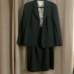 Collections for suit black. Jacket is size 20W MIDI Skirt is size 22w.